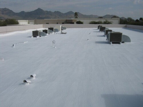 A commercial flat roof after being coated with white elastomeric paint from Sunland Coatings in Phoenix, AZ.